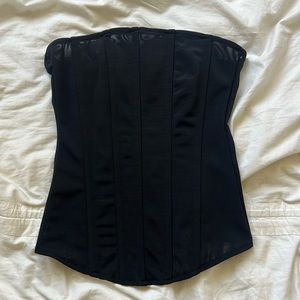 Form fitting corset. Never worn. Fits like a medium